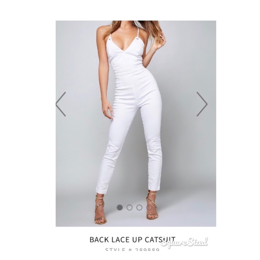 Bebe white lace up back jumpsuit